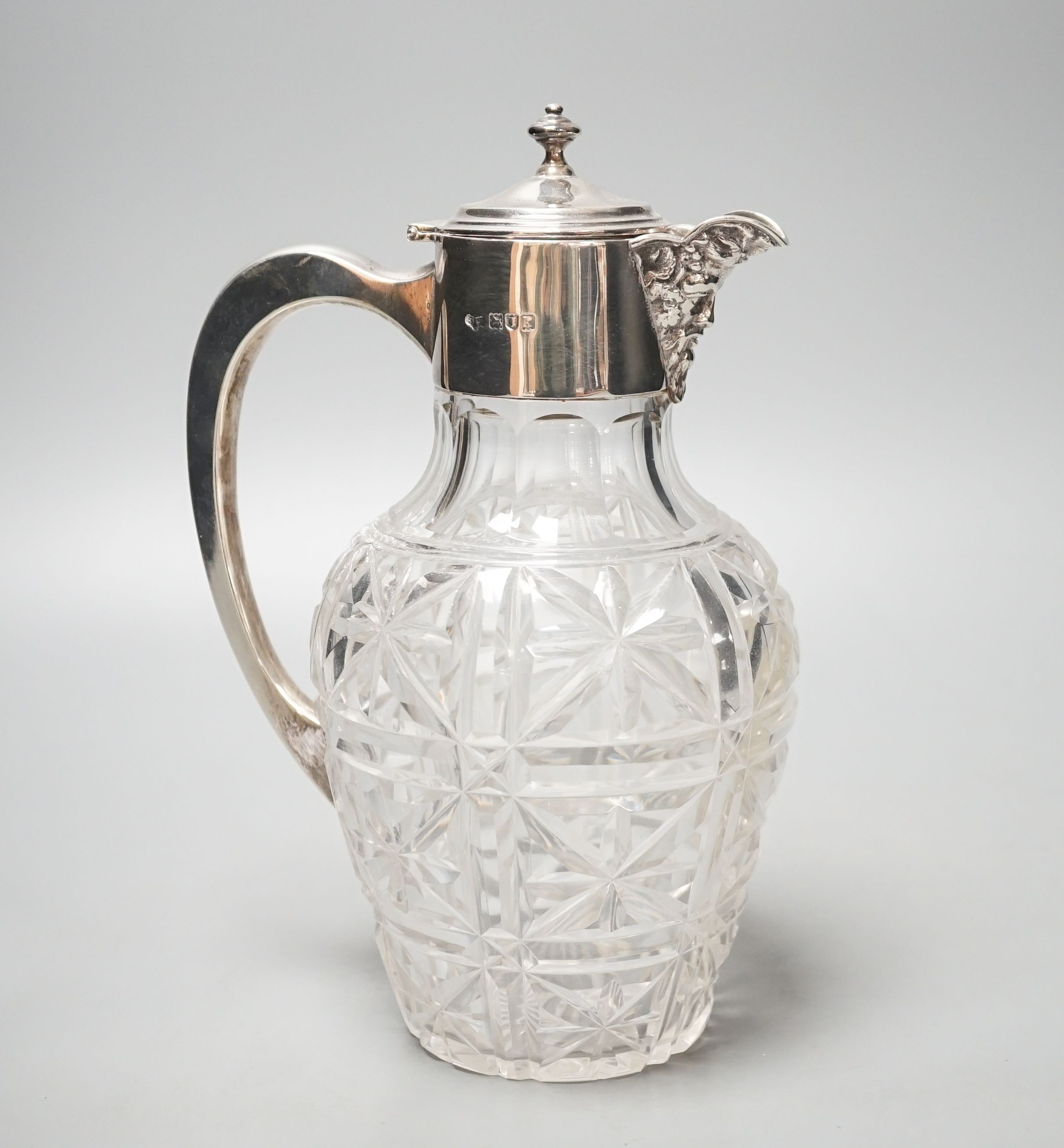 An Edwardian silver mounted cut glass claret jug, Goldsmiths & Silversmiths Co Ltd, London, 1905, 23cm.